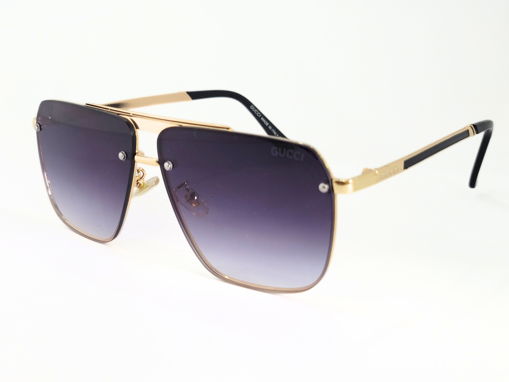 Gucci Square Aviator Sunglasses With Gold Frame and Gradient Lenses.