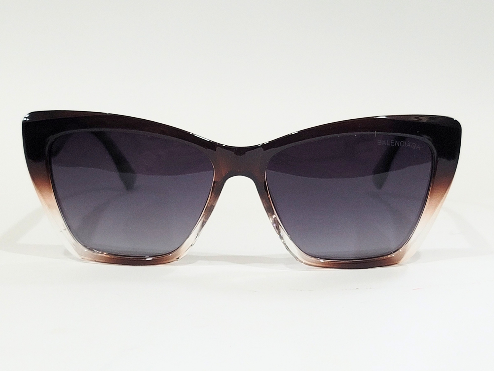 Balenciaga x Fendi sunglasses with black frame and gradient lenses.