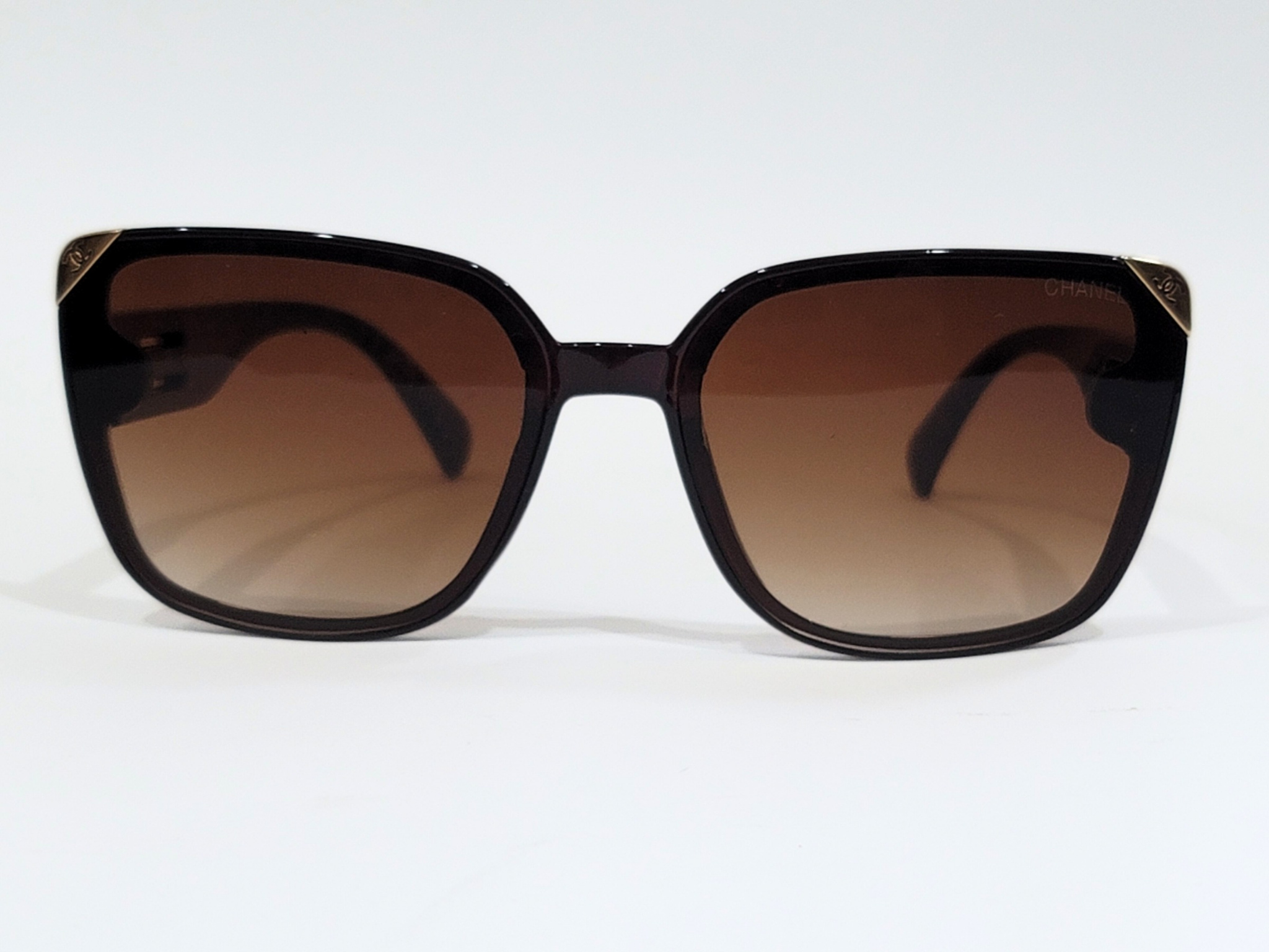 Chanel Black Square Sunglasses with Brown Gradient Lenses for Women.