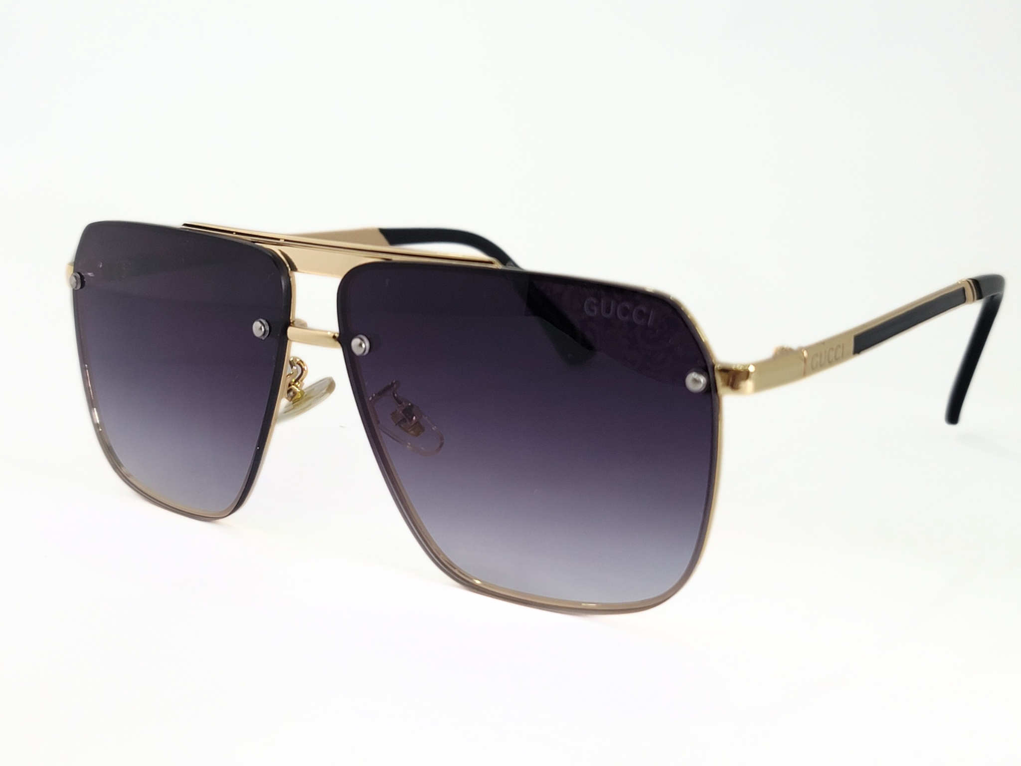 Gucci Square Aviator Sunglasses With Gold Frame and Gradient Lenses.