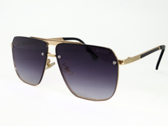 Gucci Square Aviator Sunglasses With Gold Frame and Gradient Lenses.