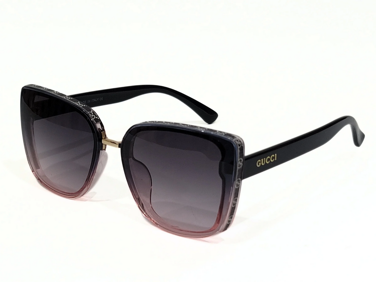 Gucci Black Square Sunglasses with Gradient Lenses and Gold Accents.