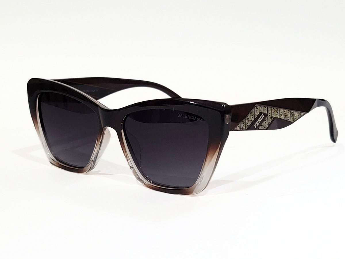 Balenciaga x Fendi sunglasses with black frame and gradient lenses.