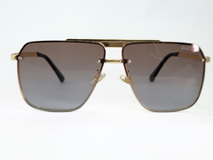 Gucci Square Aviator Sunglasses With Gold Frame and Gradient Lenses.