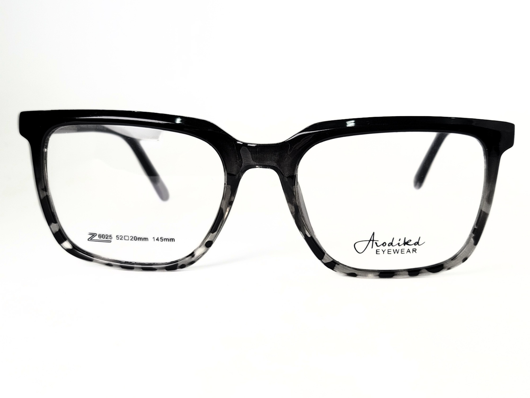 Avodike-Eyewear with a black and grey patterned frame. The frame is thick and square -shaped