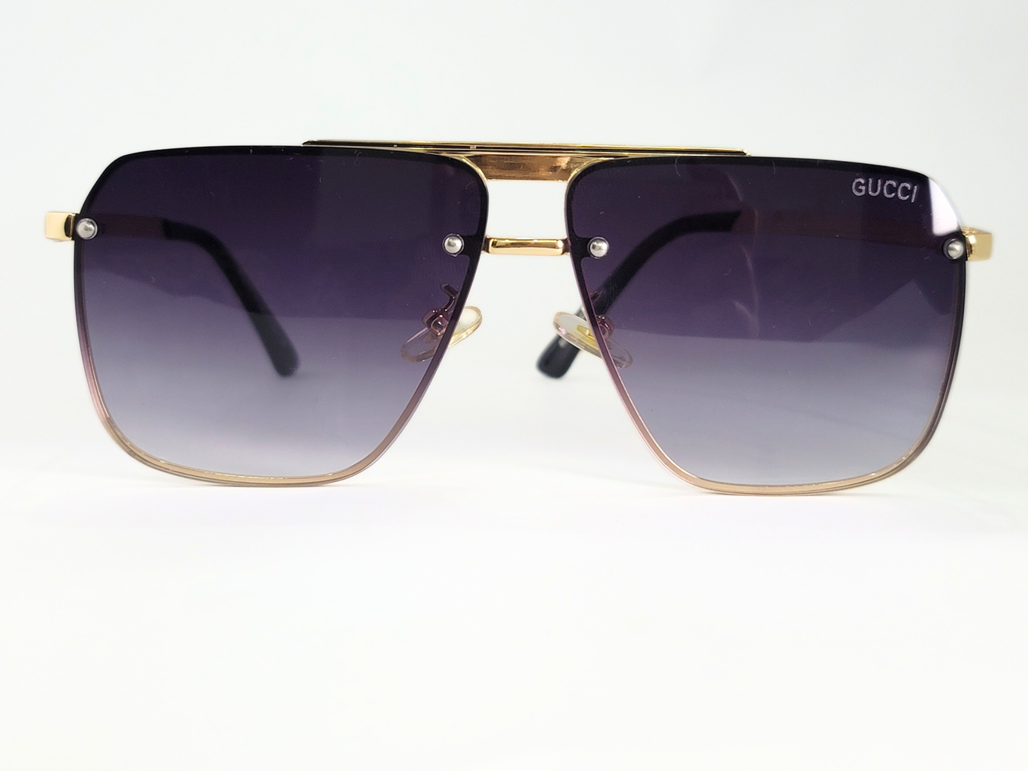 Gucci Square Aviator Sunglasses With Gold Frame and Gradient Lenses.